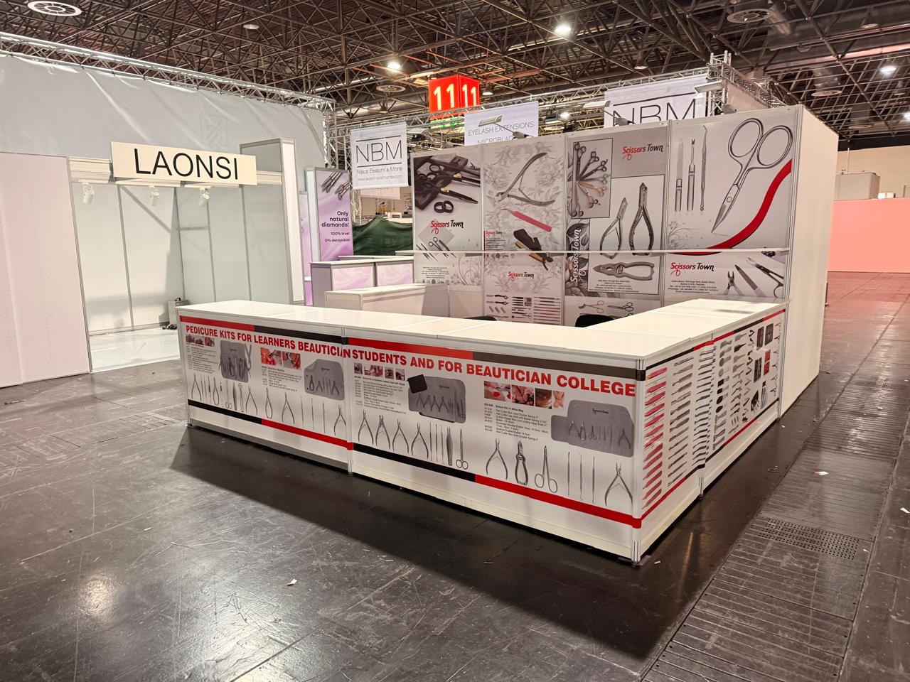 The Scissors Town stand with beauty tool and pedicure kit displays. Beauty Düsseldorf 2025.