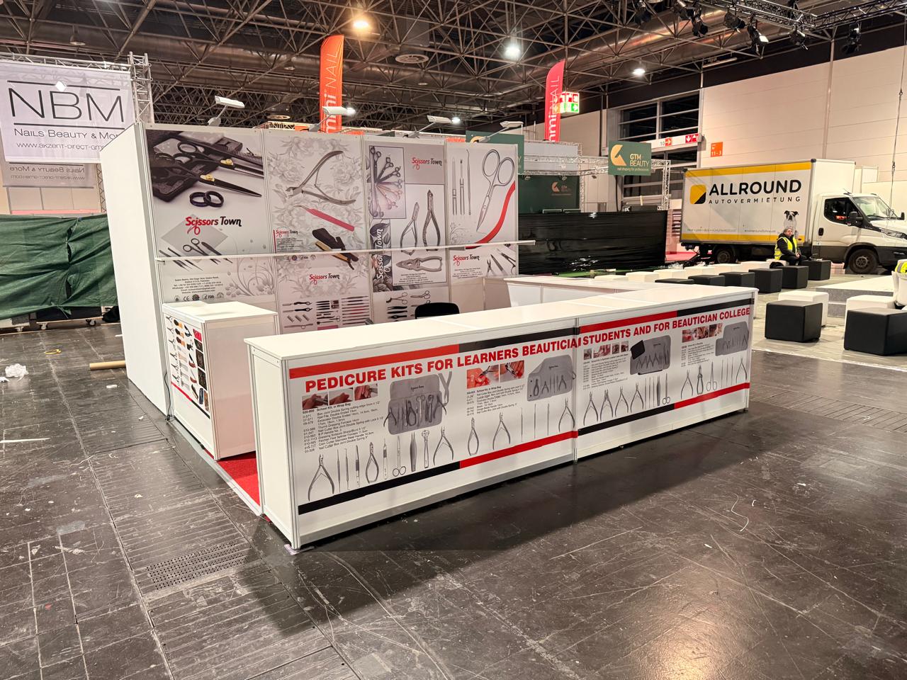 Our exhibition stand during setup, with product displays in place. Beauty Düsseldorf 2025.