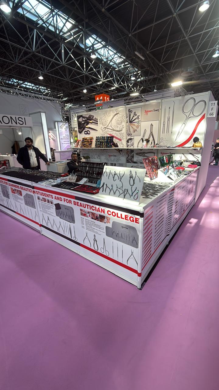 A view of the Scissors Town stand and its scissors and beauty instruments. Beauty Düsseldorf 2025.
