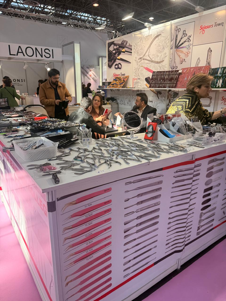 Visitors and our team beside the manicure and pedicure instruments. Beauty Düsseldorf 2025.