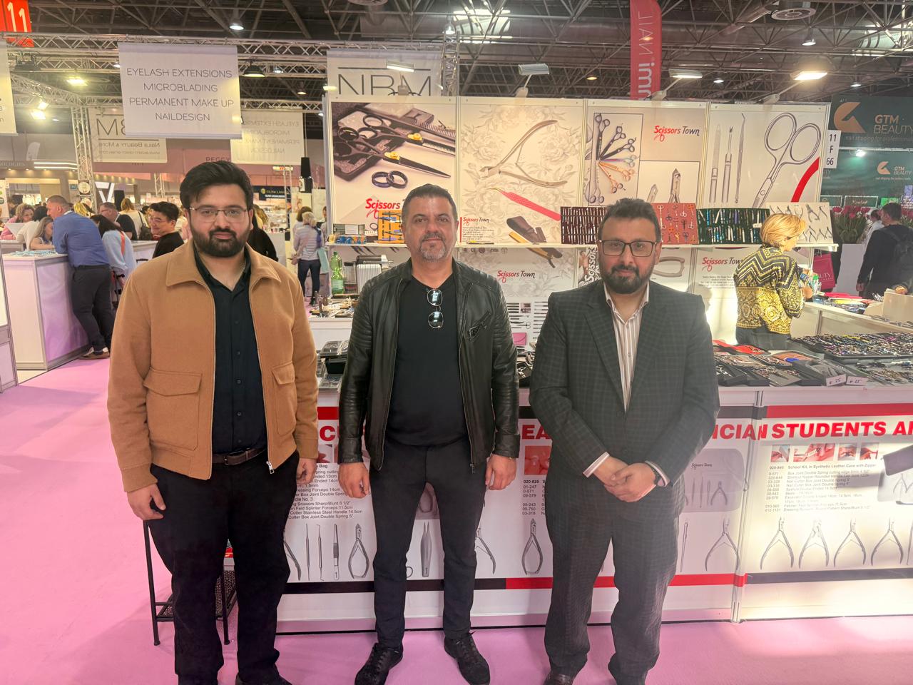 A photograph at the Scissors Town stand with our product displays in the background. Beauty Düsseldorf 2025.