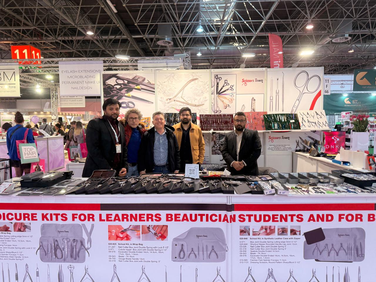A group photograph beside our professional scissors and beauty instruments. Beauty Düsseldorf 2025.